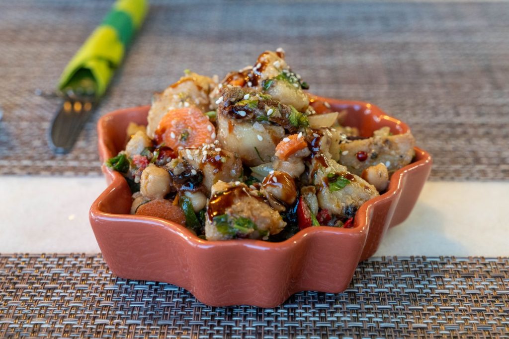 Signature gluten-free dish prepared with fresh local ingredients at ELaiolithos in Naxos