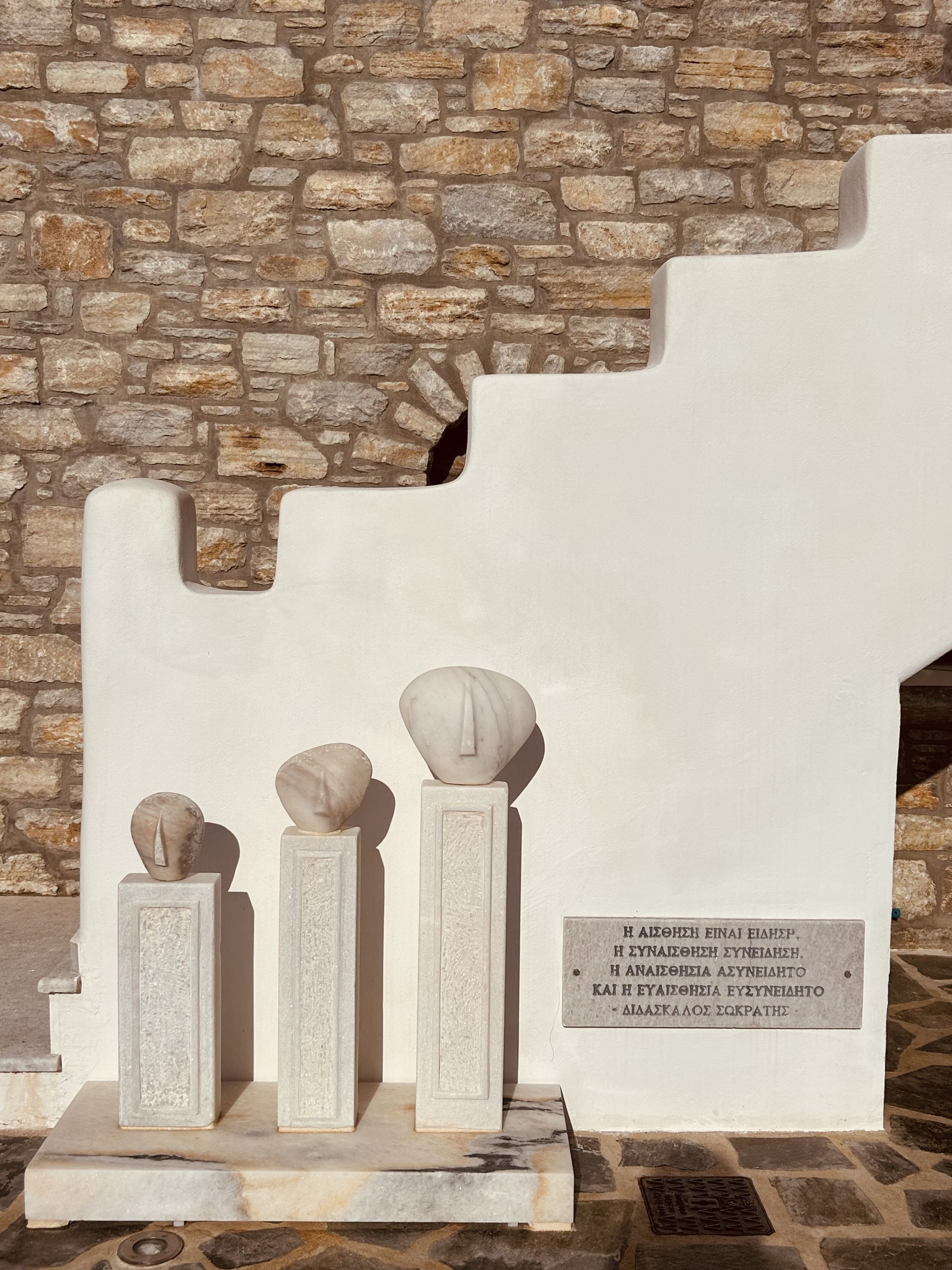 Greek Philosophy and Heritage at ELaiolithos Ancient Naxian marble idols and Socrates quote at ELaiolithos symbolizing Greek philosophy and heritage