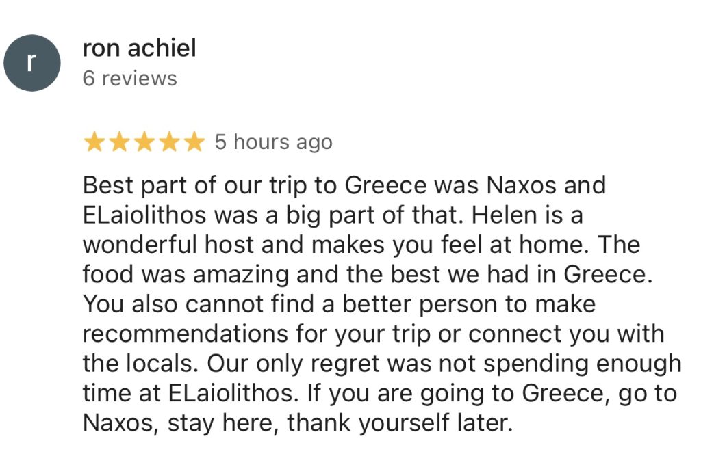 Screenshot of a verified guest review for ELaiolithos - Luxury Villa Suites, highlighting the authentic experience, mountain hospitality, and connection to Naxian culture.