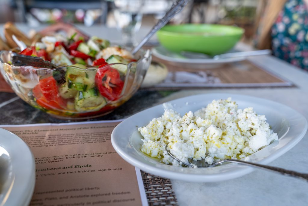 Fresh, local farm-to-table dishes at ELaiolithos in Naxos, featuring regional vegetables, cheeses, and artisanal ingredients