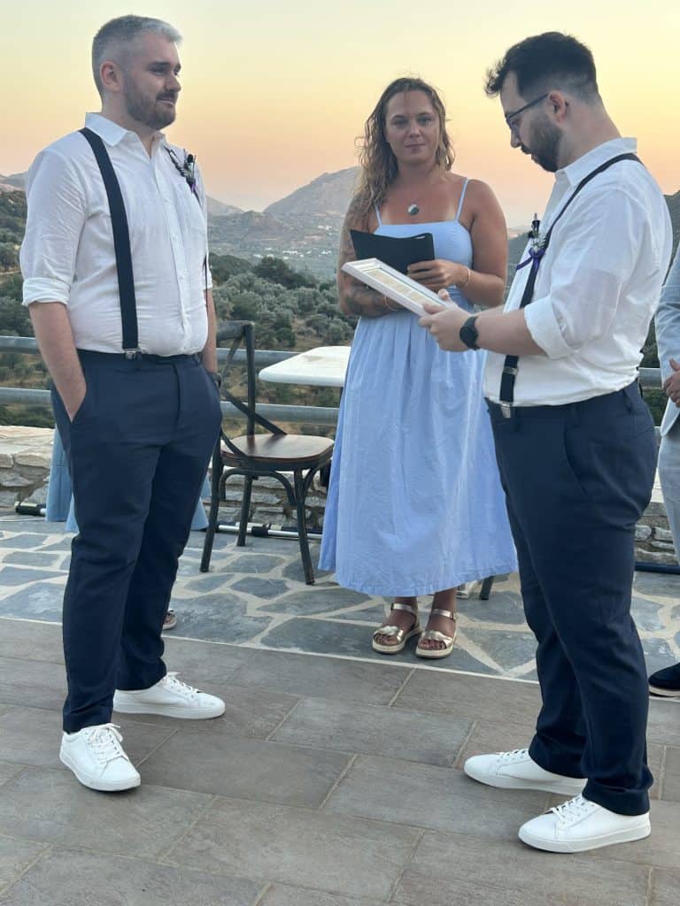 LGBTQ+ elopement couple with Mount Zas and the Naxian landscape at sunset